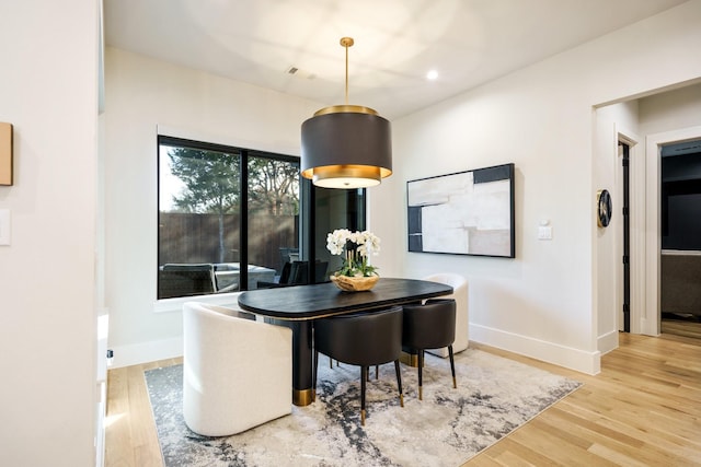 dining room featuring hardwood / wood-style flooring