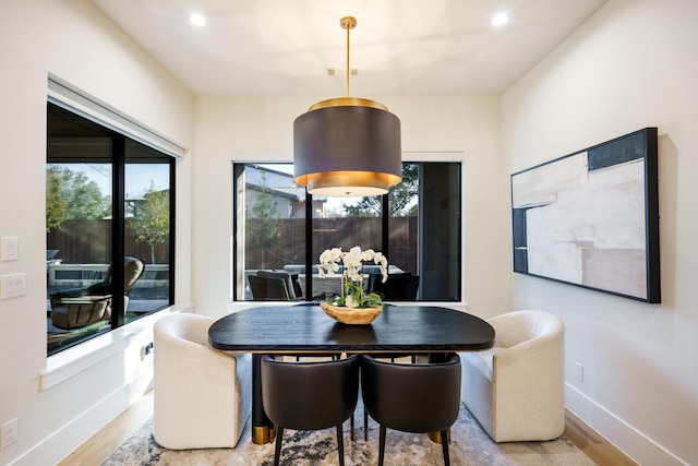 dining room featuring light wood-type flooring