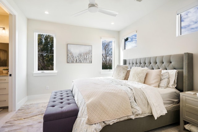 bedroom with light colored carpet and ceiling fan