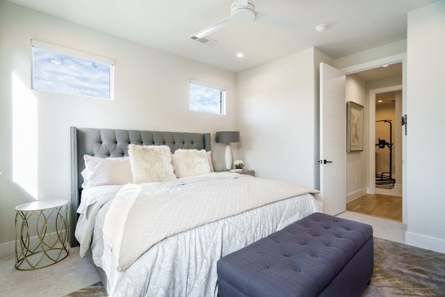 bedroom with ceiling fan and carpet floors