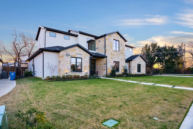 view of front of house with a lawn