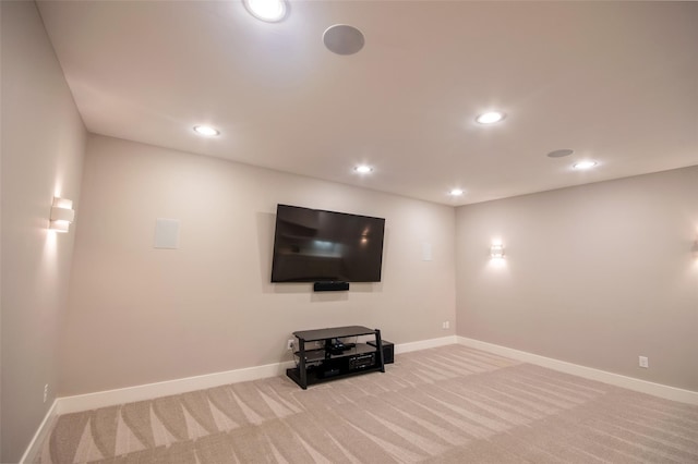 basement featuring light carpet