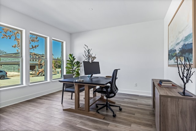 home office featuring dark hardwood / wood-style floors