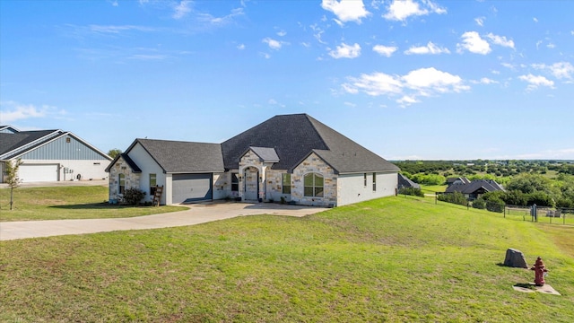 320 Kenyon Ct, Granbury, TX 76049 - french country inspired facade with stone siding, concrete driveway, and a garage