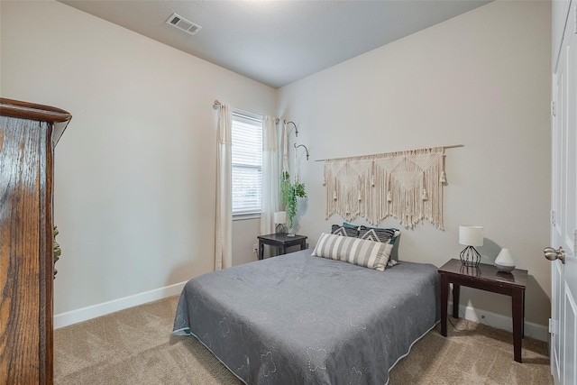 bedroom featuring carpet