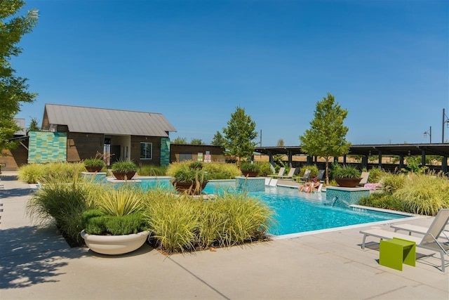 view of pool with a patio