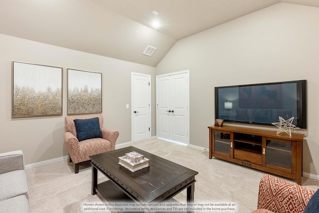 carpeted living room with lofted ceiling