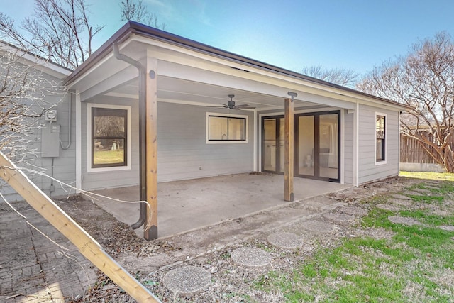 back of house featuring ceiling fan and a patio