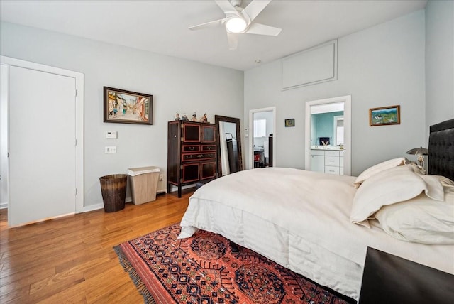 bedroom featuring vaulted ceiling, ceiling fan, and light wood-type flooring