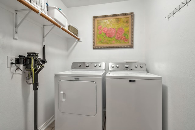 laundry room featuring separate washer and dryer