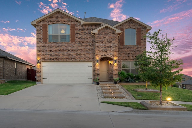 front of property with a garage