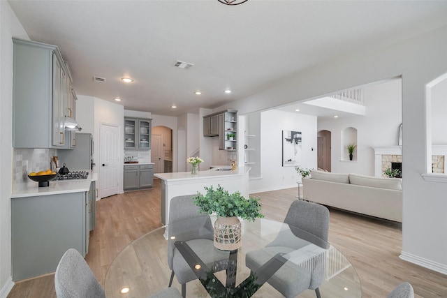 dining area with light hardwood / wood-style flooring