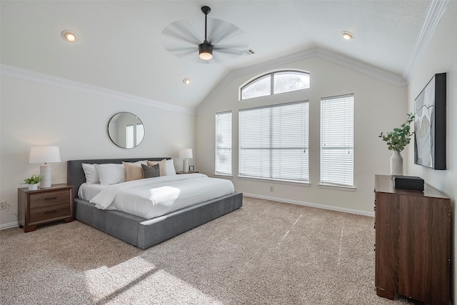 carpeted bedroom featuring vaulted ceiling, ceiling fan, crown molding, and multiple windows