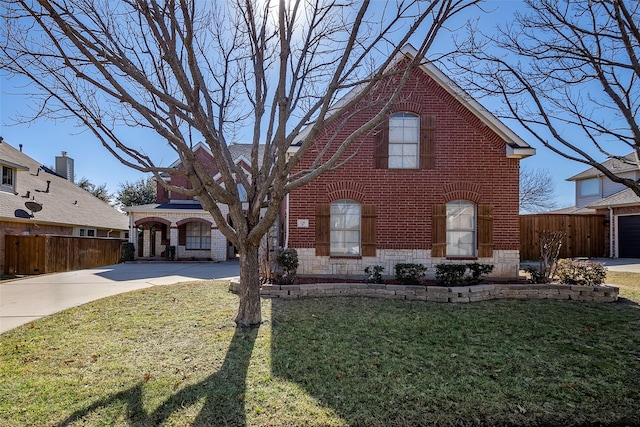 view of front of house with a front lawn