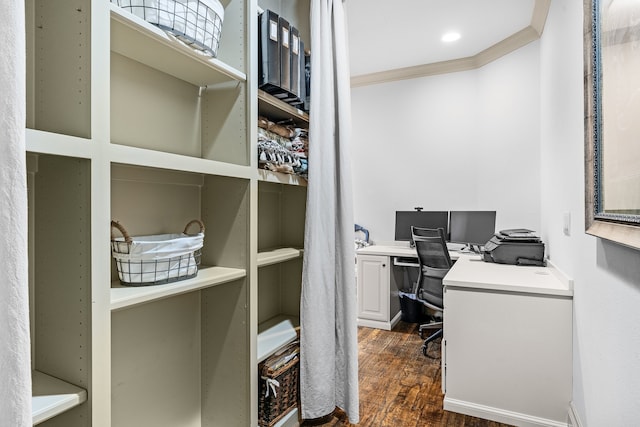 office area with crown molding and dark wood-type flooring