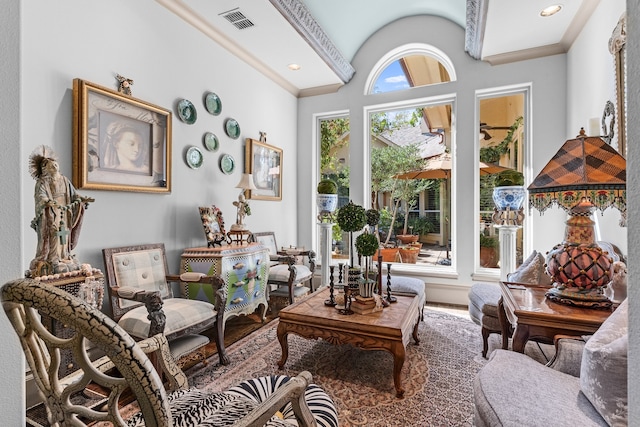 sitting room featuring lofted ceiling