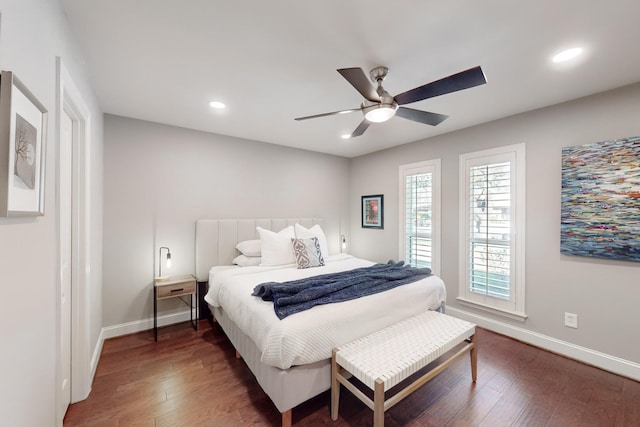 bedroom featuring ceiling fan and dark hardwood / wood-style floors