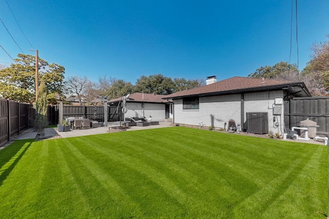 rear view of house featuring cooling unit, a patio, outdoor lounge area, and a lawn