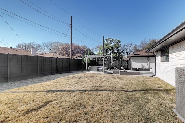 view of yard with central AC unit, a pergola, and a patio