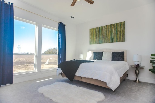 bedroom featuring carpet and ceiling fan