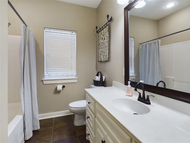 full bathroom with vanity, toilet, and shower / bath combo