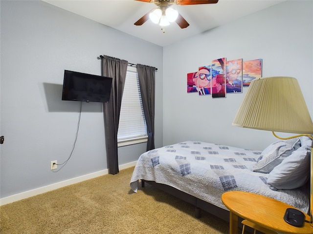 bedroom featuring carpet, multiple windows, and ceiling fan