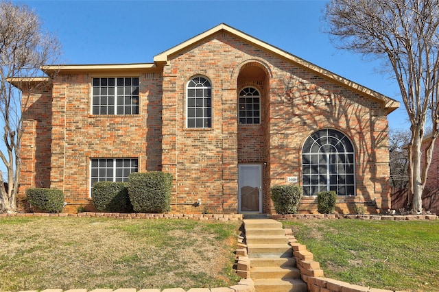 view of front of property with a front lawn