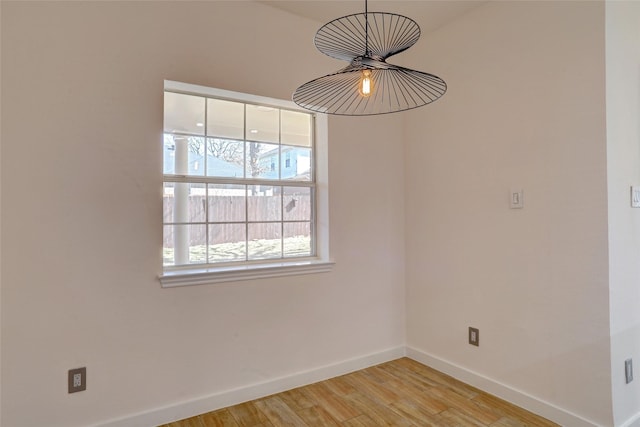 unfurnished room featuring light hardwood / wood-style floors