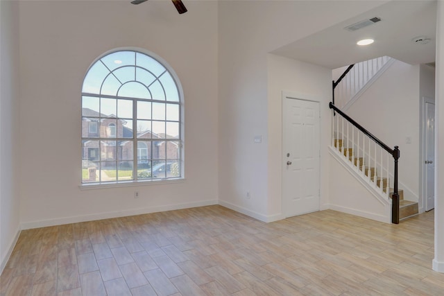 foyer with ceiling fan