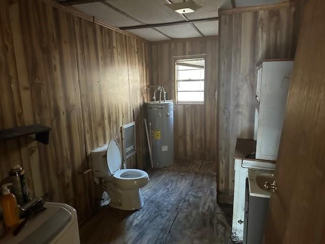 bathroom with washer / dryer and water heater