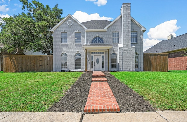 view of front facade with a front yard