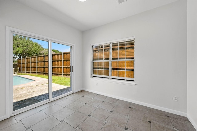 view of tiled spare room