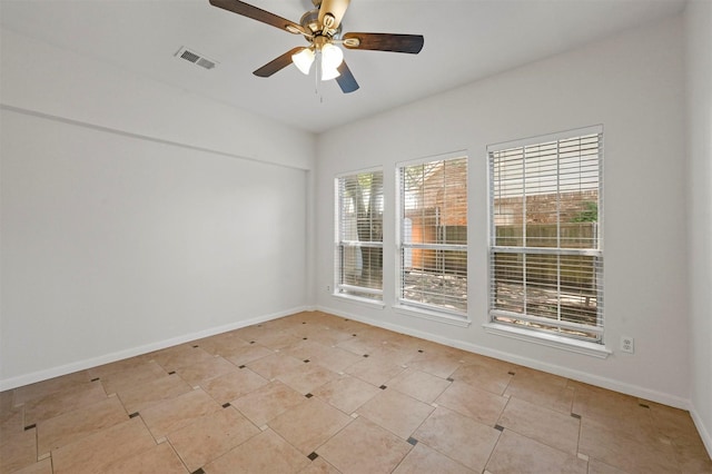 unfurnished room featuring ceiling fan