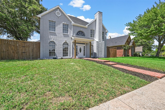 view of front facade with a front lawn