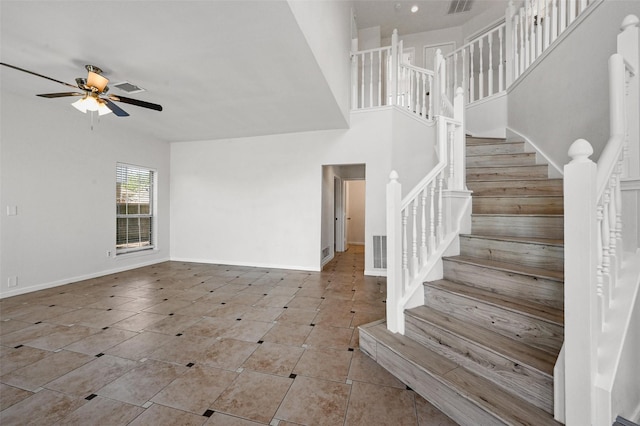 foyer featuring ceiling fan