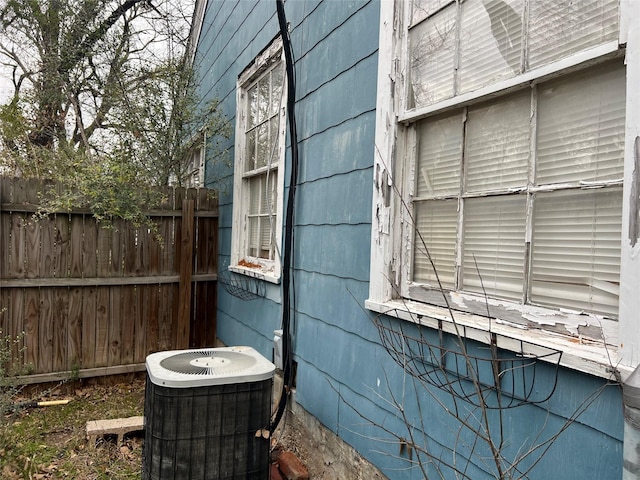 view of home's exterior with cooling unit