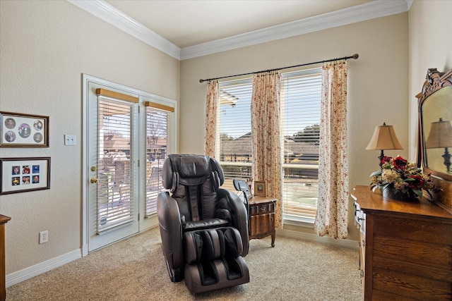 sitting room featuring ornamental molding and light carpet