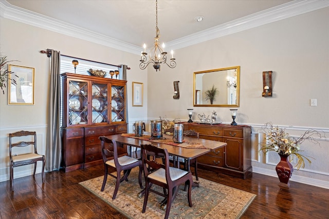 dining room with crown molding, dark hardwood / wood-style floors, and a notable chandelier