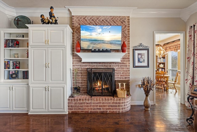 living room with crown molding, a brick fireplace, and dark hardwood / wood-style floors