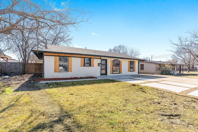 single story home featuring a front lawn