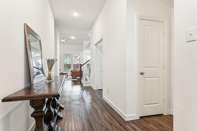 corridor with dark wood-type flooring