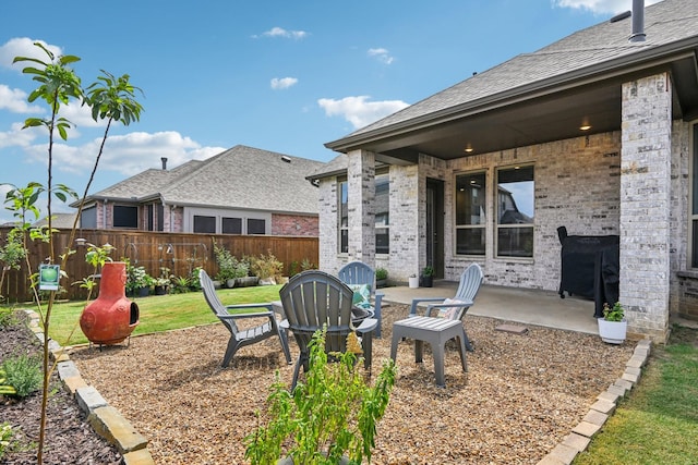 view of yard featuring a patio and fence