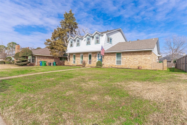 view of front of house with a front lawn