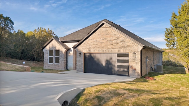 view of front of home with a front yard and cooling unit