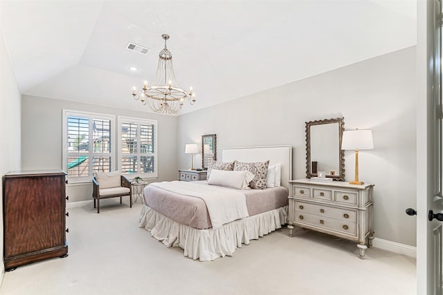 carpeted bedroom with lofted ceiling and a chandelier