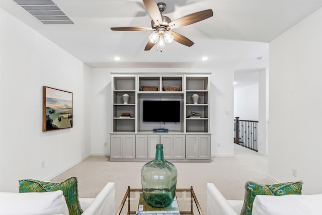 living area with a ceiling fan, recessed lighting, visible vents, and light carpet