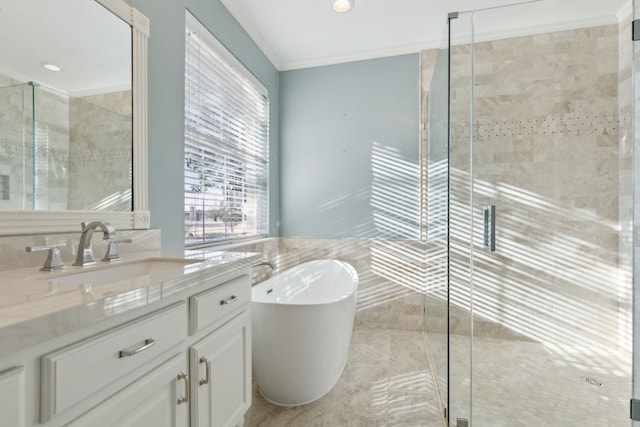 bathroom with plus walk in shower, vanity, and ornamental molding