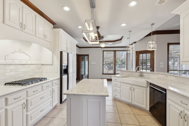 kitchen with sink, white cabinetry, dishwasher, and stainless steel gas cooktop