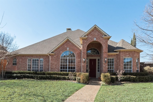 front facade with a front lawn