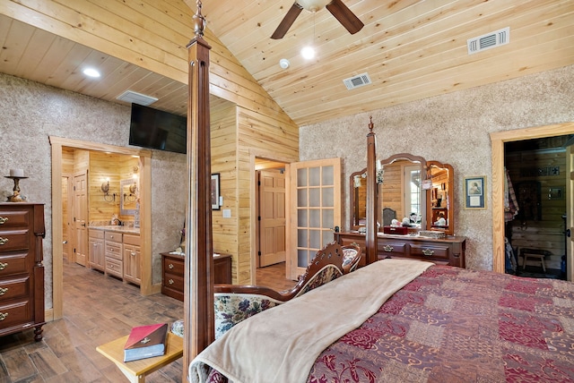 bedroom with wood ceiling, ceiling fan, connected bathroom, and dark hardwood / wood-style flooring